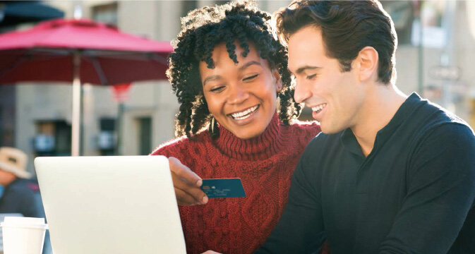 Couple banking on computer