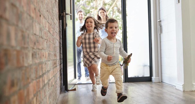 Family entering new home